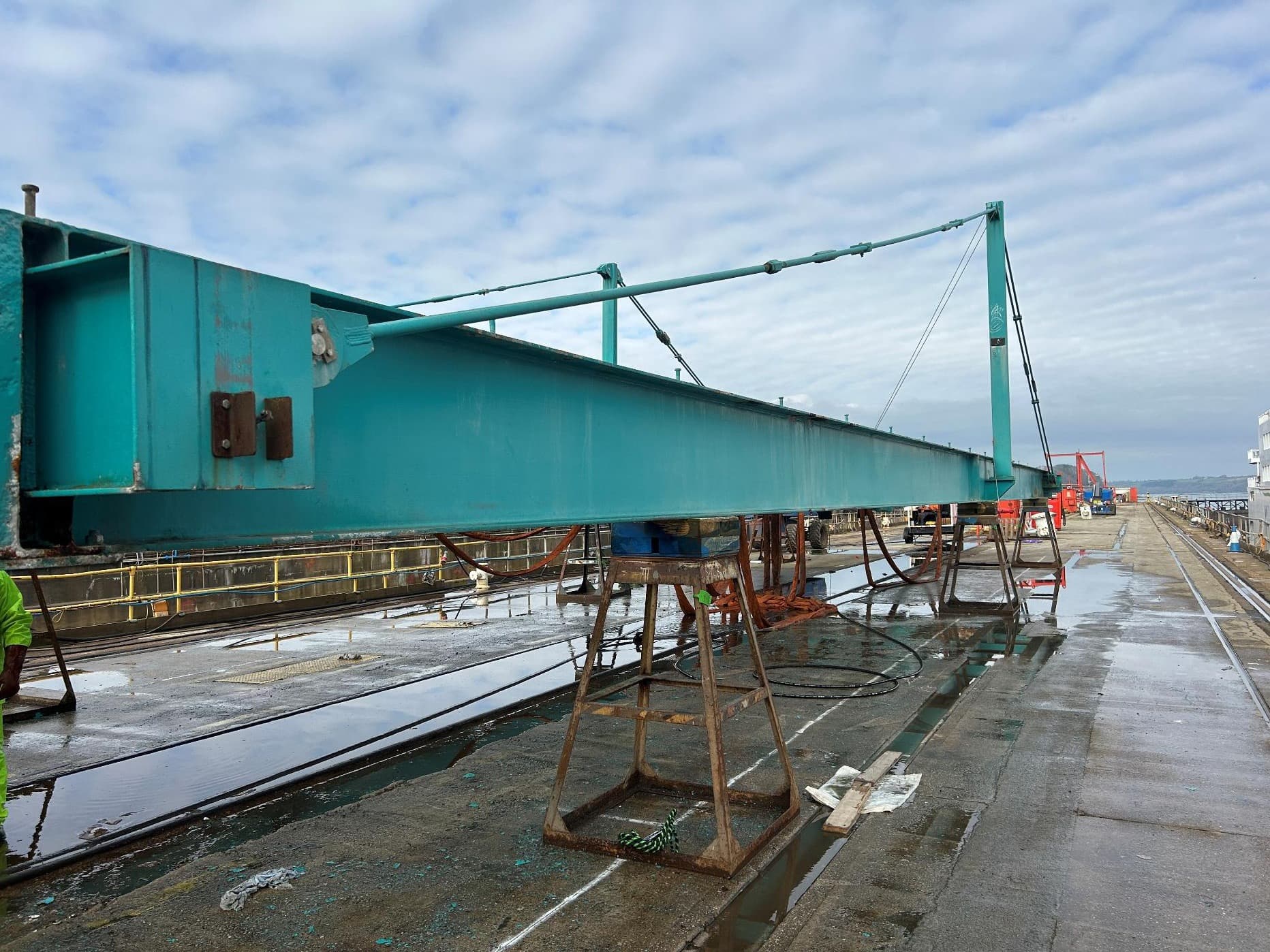 Ross Creek swing bridge girder in an enclosure during repainting